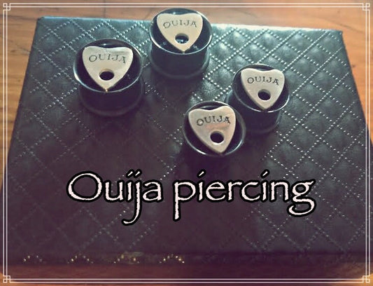 Ecarteur tunnel oreille OUija . la paire en acier chirurgical.