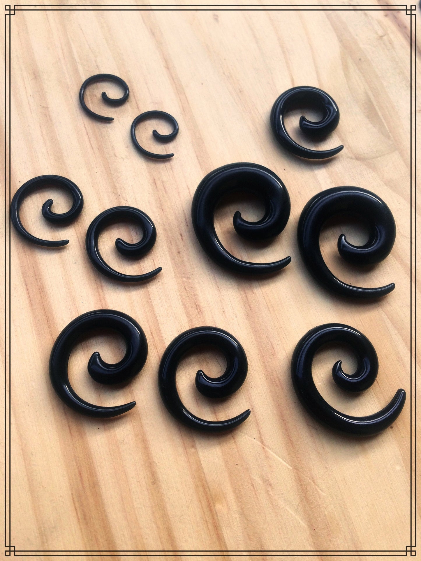 Elargisseur spirale noire acrylique à l'unité